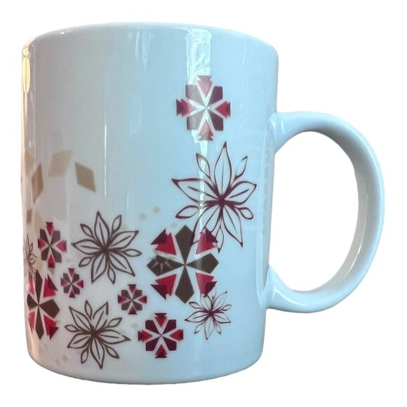 Starbucks Holiday Star Poinsettia Snowflake Coffee Mug 12 oz Red White Christmas - Picture 1 of 6